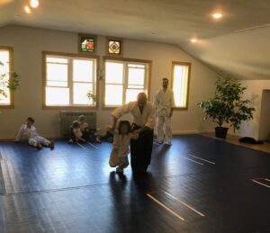 Ralph Legnini taking ukemi in art of peace aikido kids class