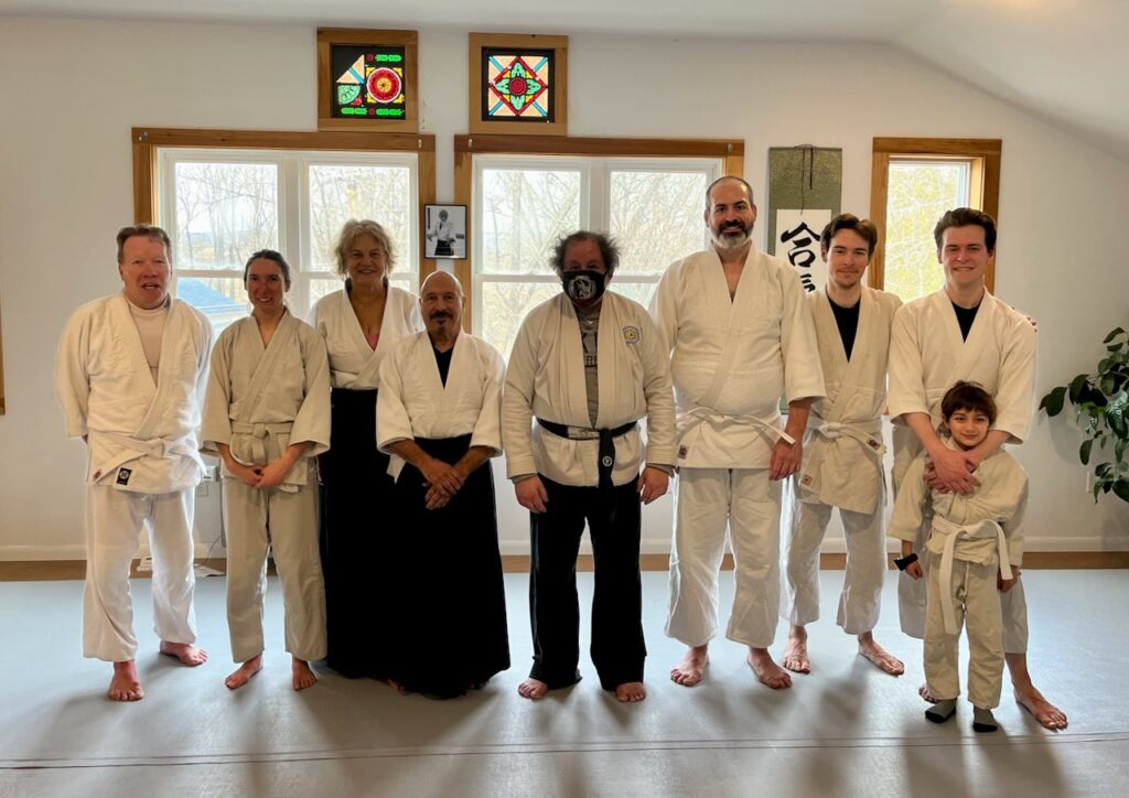 Members of Art of Peace aikido standing in front of kamiz