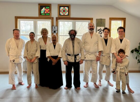 Members of Art of Peace aikido standing in front of kamiz